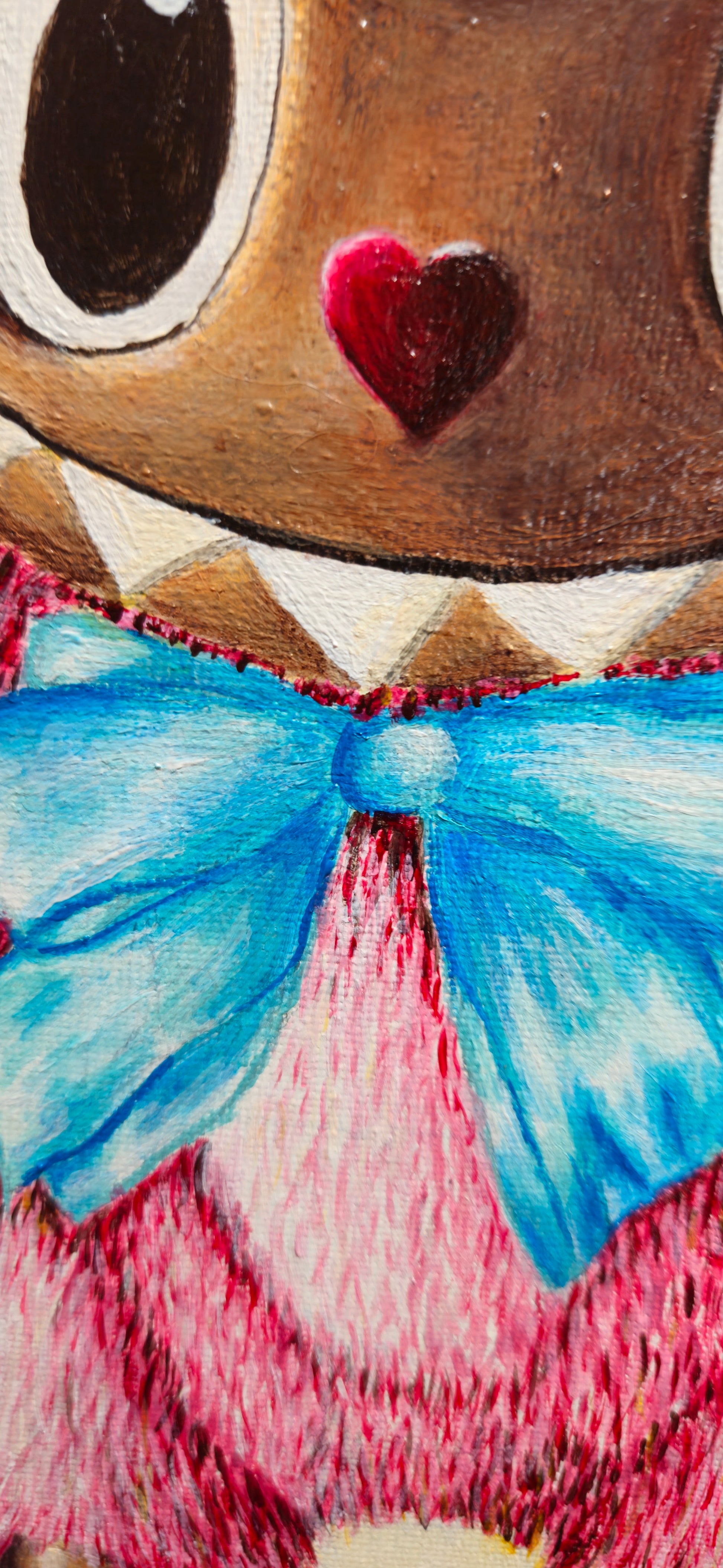 Cartoon character with a heart on its face and a blue bow tie